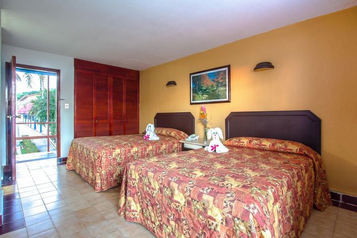 Hotel Qualton Ixtapa Zihuatanejo. Habitaciones del Hotel Qualton Ixtapa Zihuatanejo. Paquetes del Hotel Qualton Ixtapa Zihuatanejo. Ofertas del Hotel Qualton Ixtapa Zihuatanejo. Promociones del Hotel Qualton Ixtapa Zihuatanejo. Tarifas Hotel Qualton Ixtapa Zihuatanejo. Todo Incluido en el Hotel Qualton Ixtapa Zihuatanejo